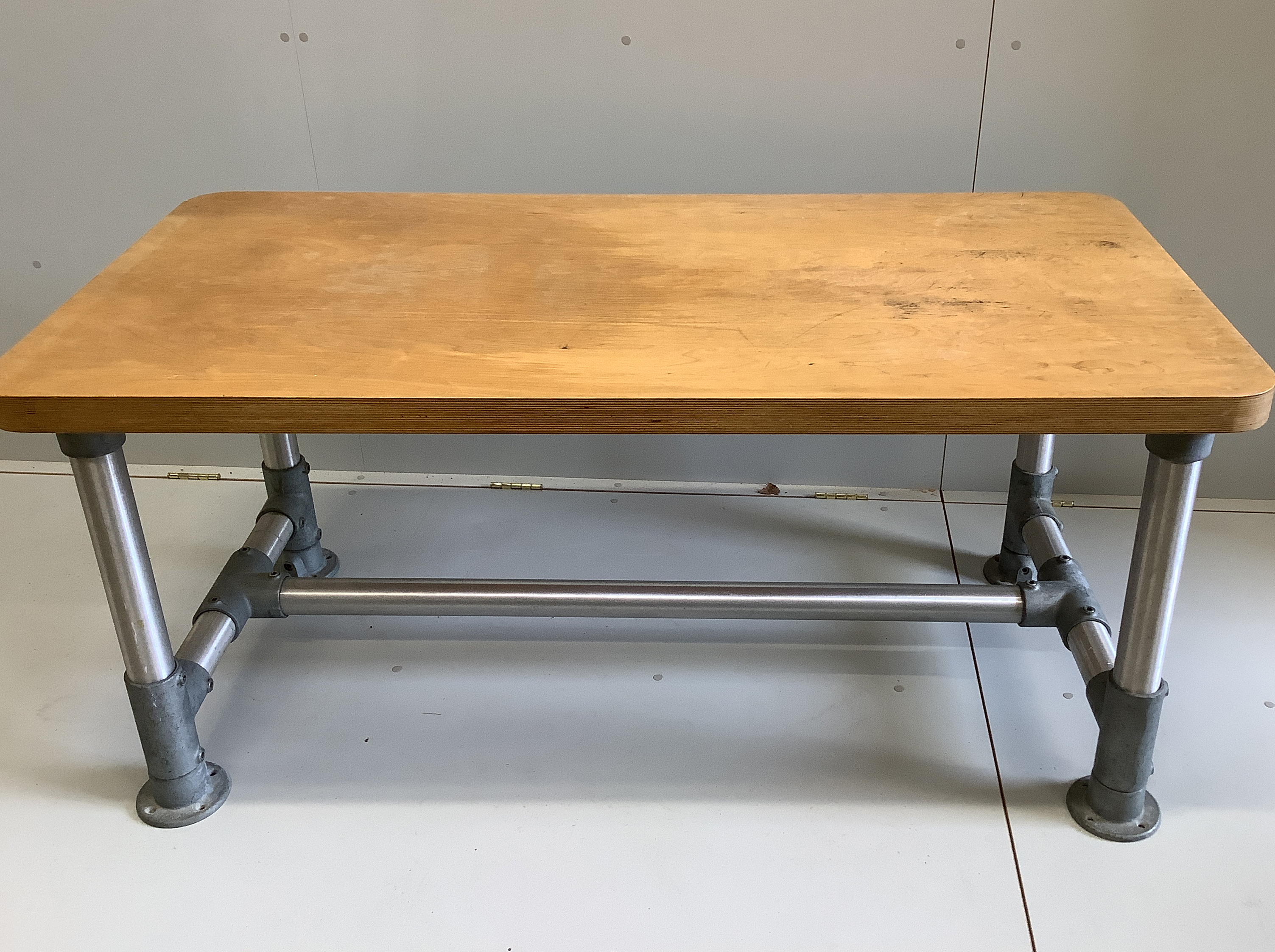 Wolff Olins. An industrial style rectangular table, circa 1970, width 150cm, depth 75cm, height 69cm